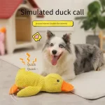 Dog sleeping with a dog hug duck toys to relieve boredom of little yellow duck pet interactive plush doll pet supplies 2