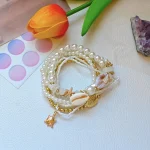 7-Piece Beach Bracelet Set: Ocean Bohemian Style, Shell, Starfish, and Pearl Pendant Bracelet, Suitable for Beach Vacations and 2
