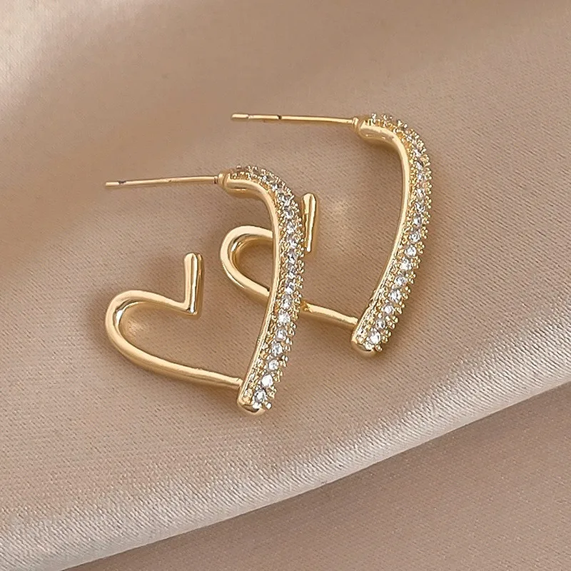 925 Silver Needle Korean Fashion Crystal Heart Earrings For Women Jewelry 2026 Trending New Luxury Women's Hoop Earrings Brincos 925 Silver Needle Korean Fashion Crystal Heart Earrings For Women Jewelry 2026 Trending New Luxury Women's Hoop Earrings Brincos