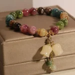 Exquisite Natural Stone Bracelet Elegant Lily of The Valley Flower Pendant Elastic Beaded Bracelets for Women Party Jewelry Gift 3