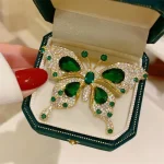 Fashion Women Girls Elegant Emerald Crystal Butterfly Brooches Badges Classic Lady Dress Suit High-end Pins Jewelry 5