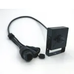 Mini PoE IP camera with attached cable, front view
