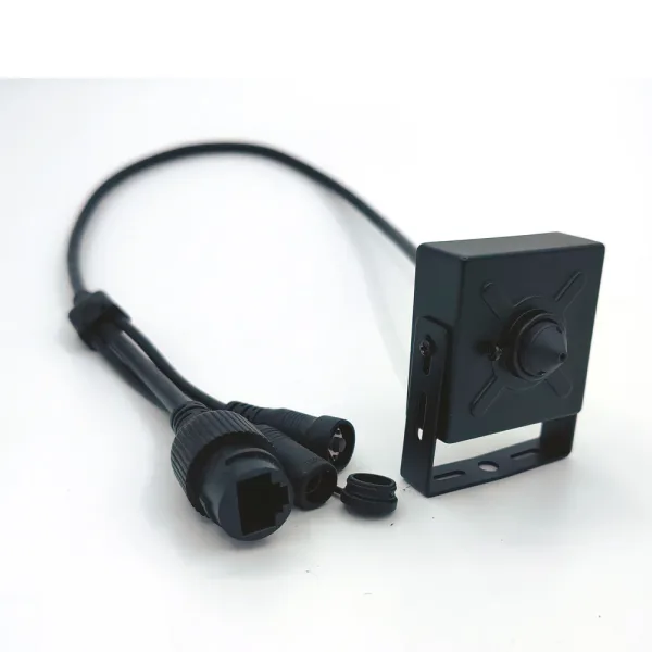 Mini PoE IP camera with attached cable, front view Mini PoE IP camera with attached cable, front view
